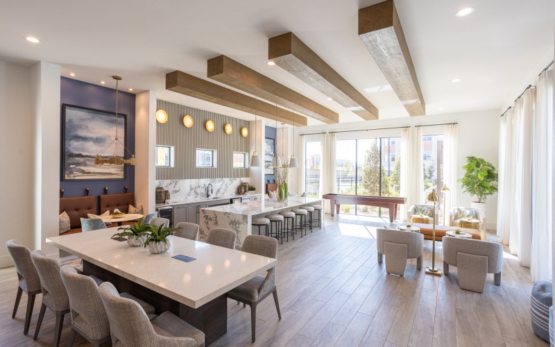 clubroom kitchen with a table and chairs